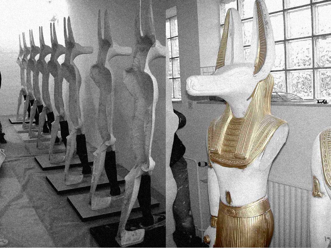 Anubis_Finishing_Gold Anubis sculpture fabrication, row of de-molded statue halfs before joining.