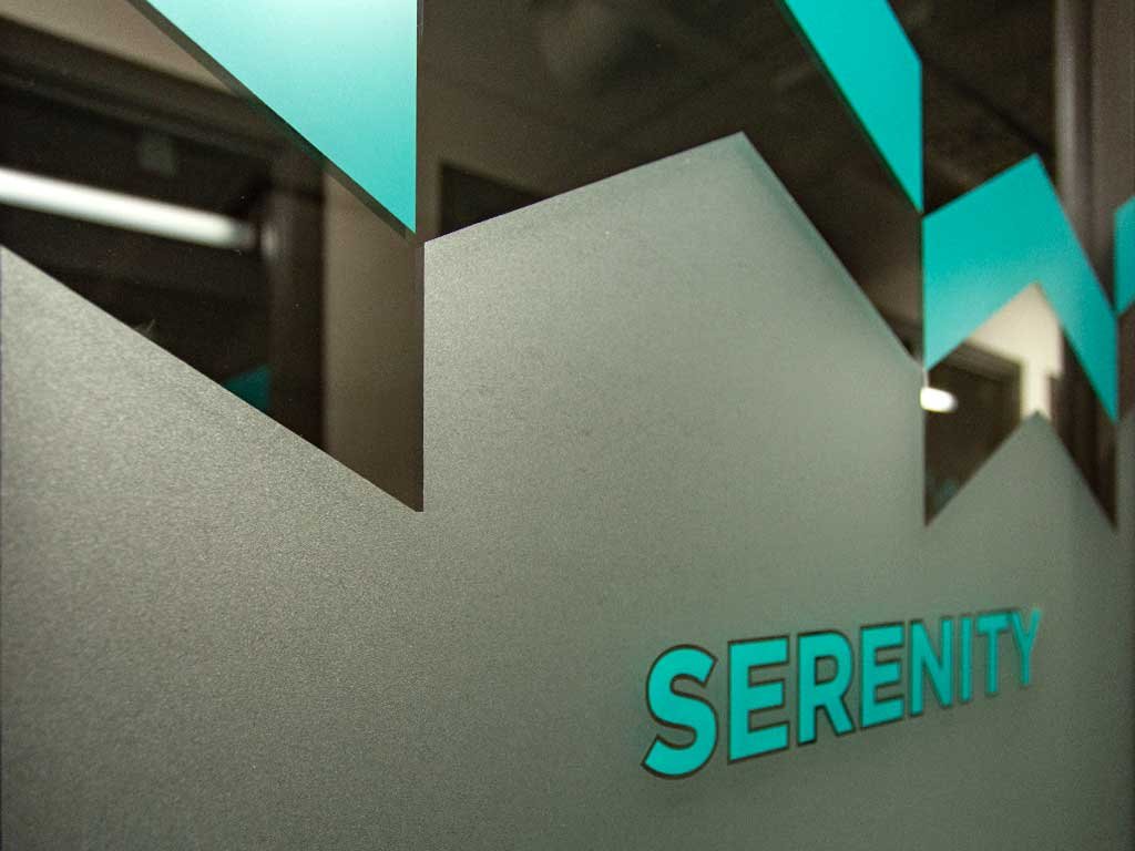 PROJECT_UP_Privacy_2 Custom privacy decals were applied to interior glass partitions and office facades.