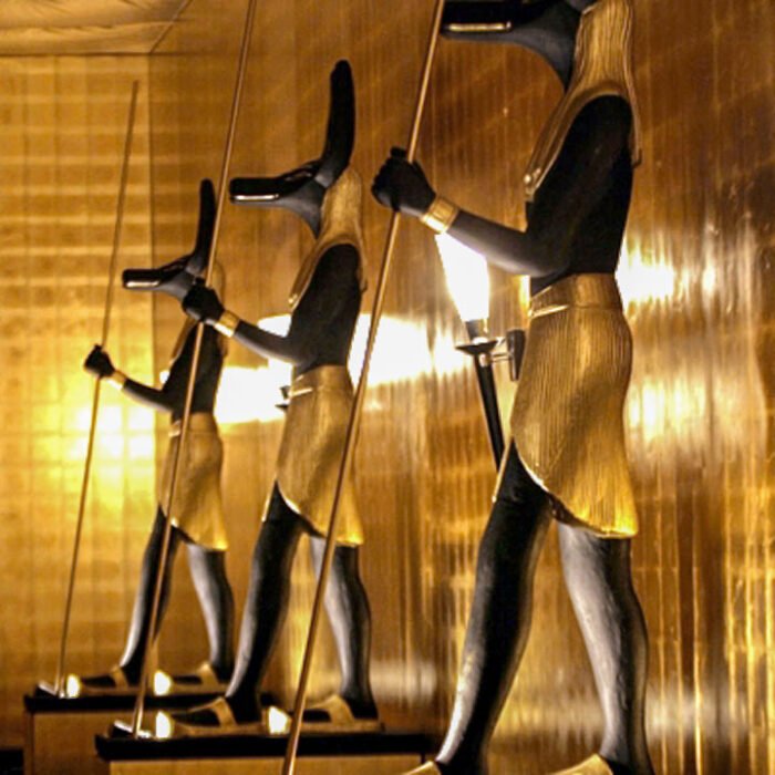 Giant 7 feet tall golden Anubis sculptures.