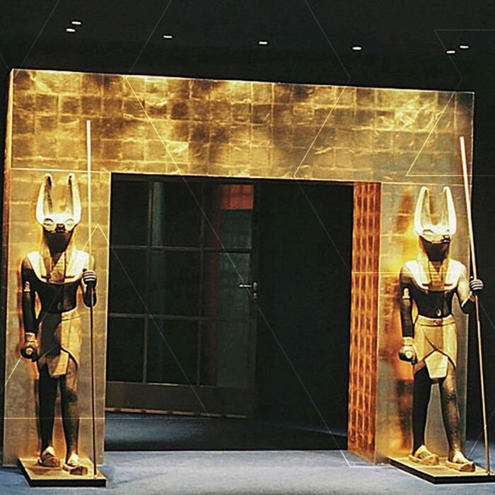 PROJECT_Cover_Anubis - The Bees Knees Design Event fabrication, golden gate entrance with 2 Anubis sculptures.