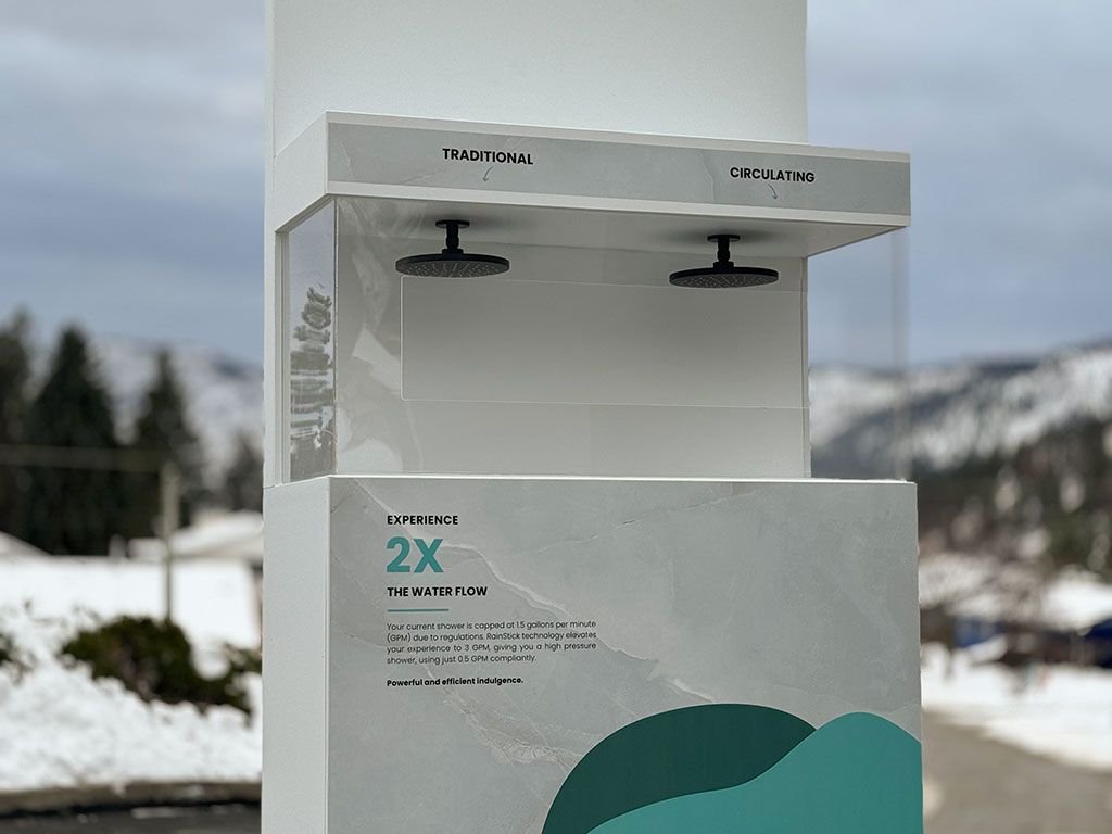 PROJECT_Rainstick_Water_4 Retail activation display with two shower heads and custom branding.
