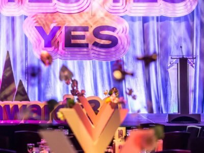 30084460_243714412868376_1093547253936685056_n Large foam letters hanging rigged off on stage reading "yes, yes, yes, yes.