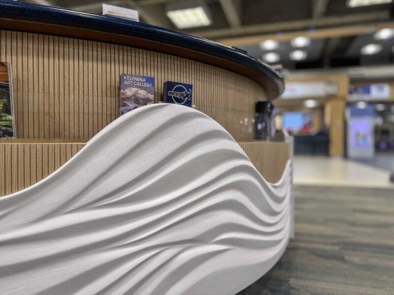 Tourism Kelowna Kiosk - Sculpted Reliefs Custom kiosk fabrication for tourism kelowna at the Kelowna International Airport.