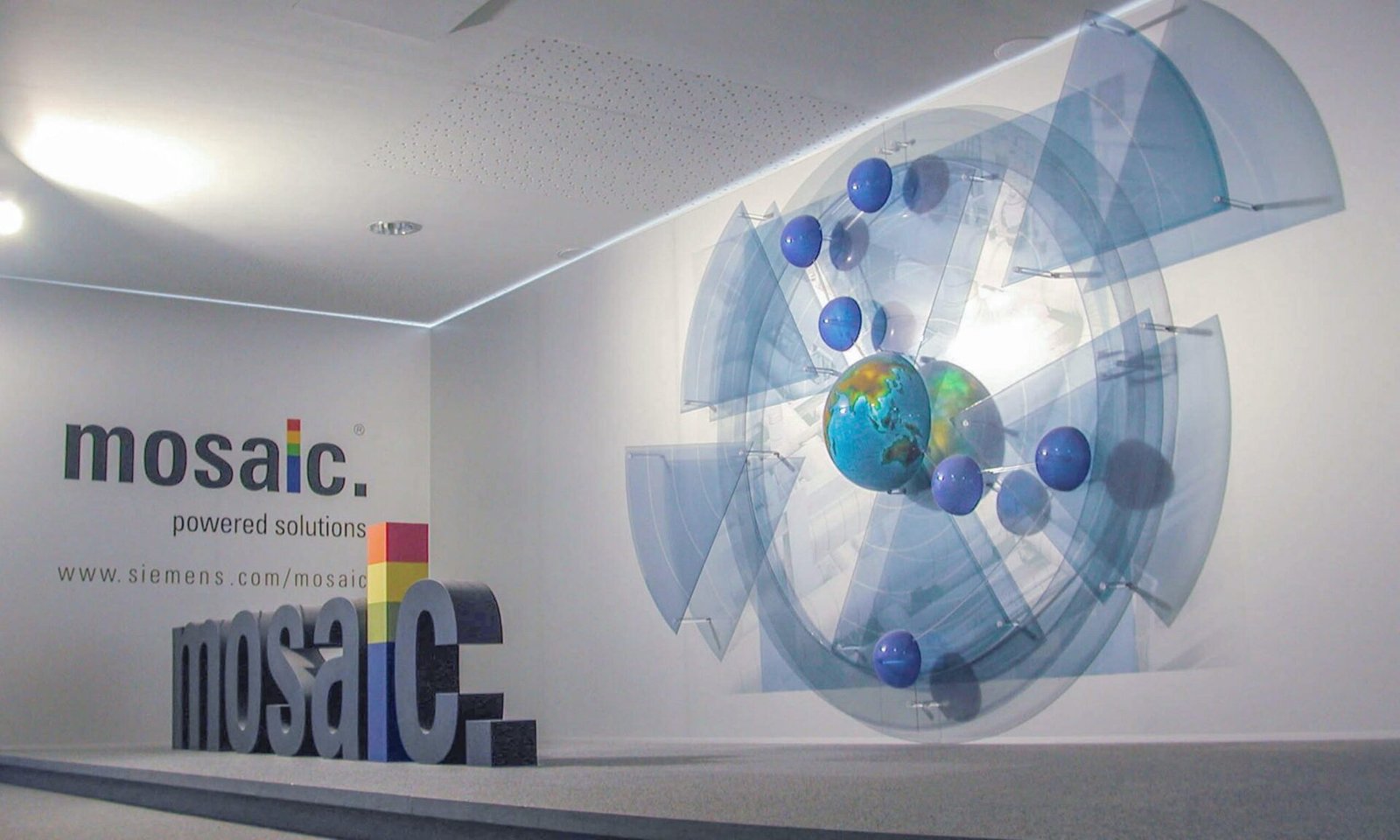 7-MESSE-mosaic Branded Environments, Mosaic Siemens showroom dimensional wall installations.