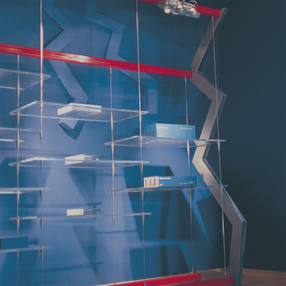 Cover_Bintec_Square Pop up fabrication with a custom shelf with acrylic boards supporting displayed products.