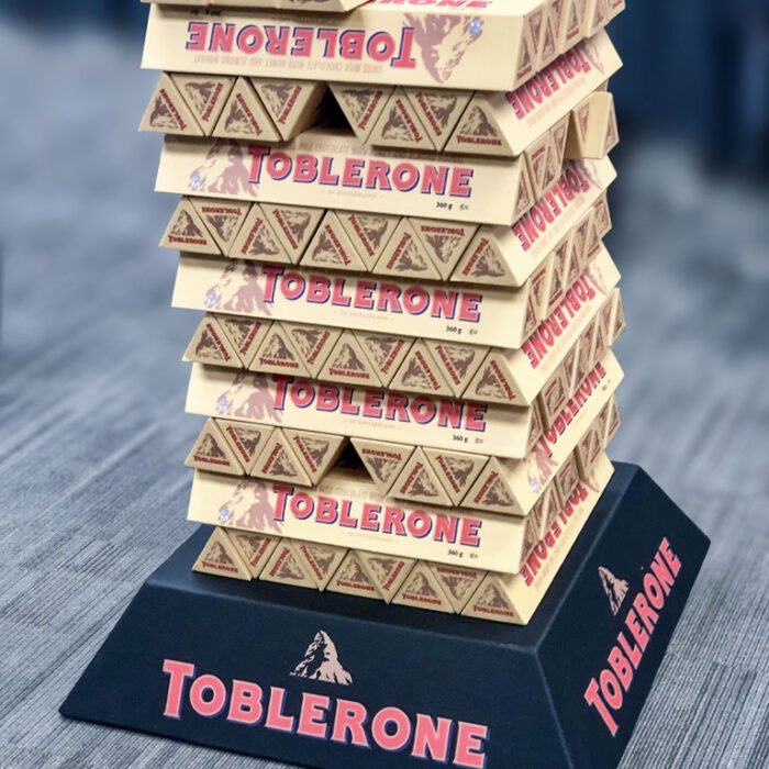 PORTRAIT_Toblerone - The Bees Knees Design Toblerone bars stacked to build a tower at a brand activation event | TBKD