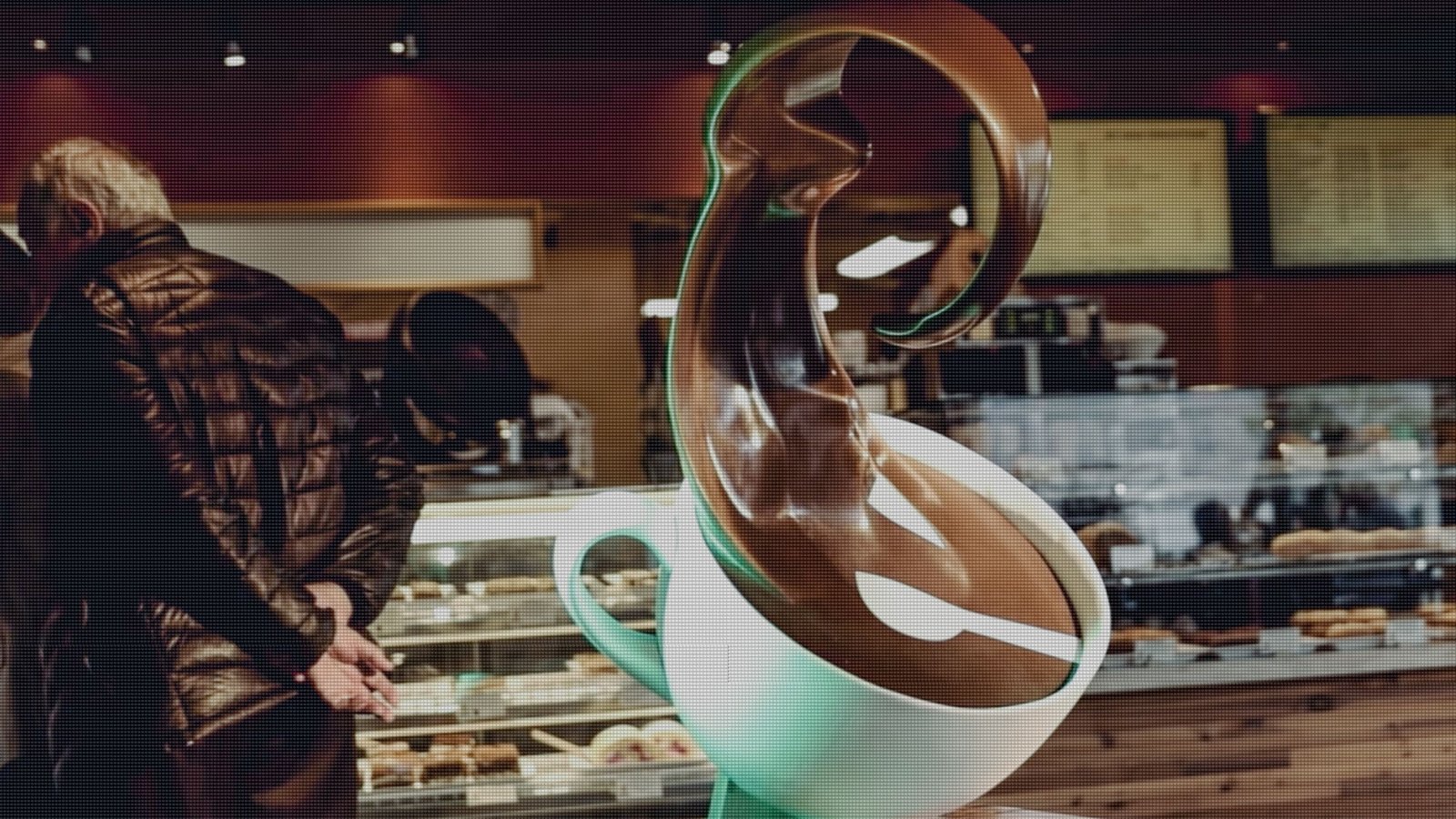 Custom_Displays_COVERS Person in a brown leather jacket browses pastries at a bakery counter beside a large abstract spilled coffee cup shop window display.