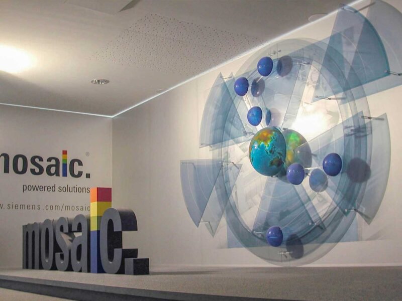 Gallery_Mosaic_Exhibits Custom museum exhibit fabrication comprised of wall mounted transparent acrylic displays and freestanding dimensional letters reading "MOSAIC".