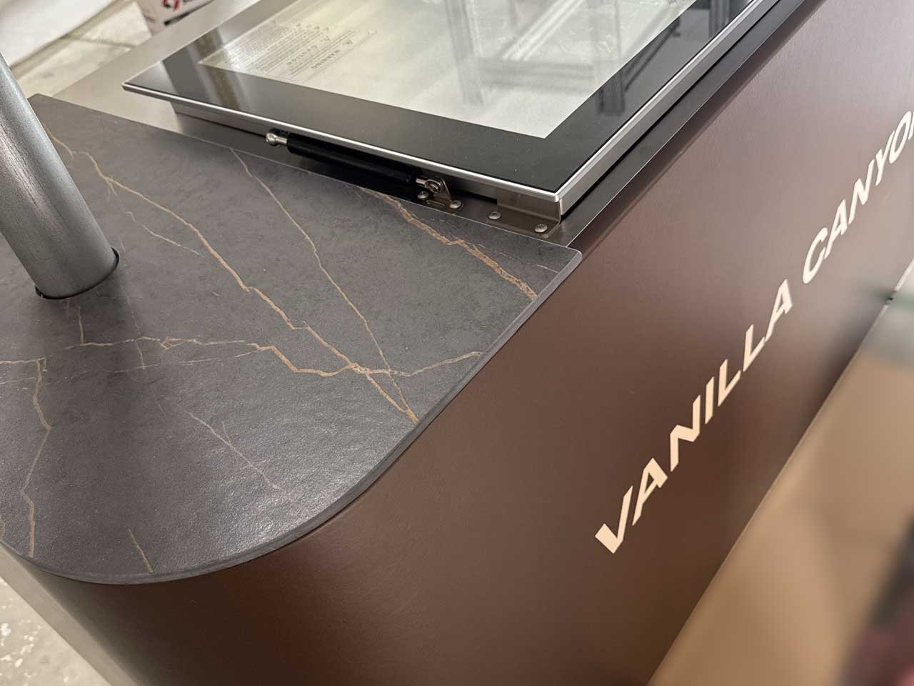 PHLUR_Sephora_Dekton_Quartz_horizontal Branded ice cream cart with DEKTON quartz countertops and built in freezer for PHLUR Sephora.