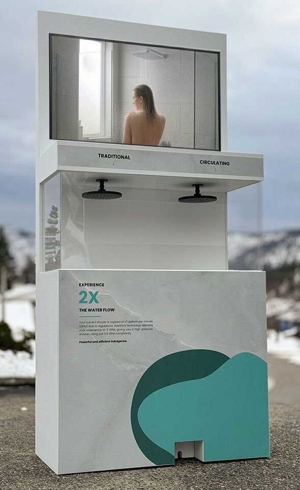 PROJECT_Rainstick_Screen Branded custom displays with integrated foot padel demonstrating water flow and a screen to showcase product specs.