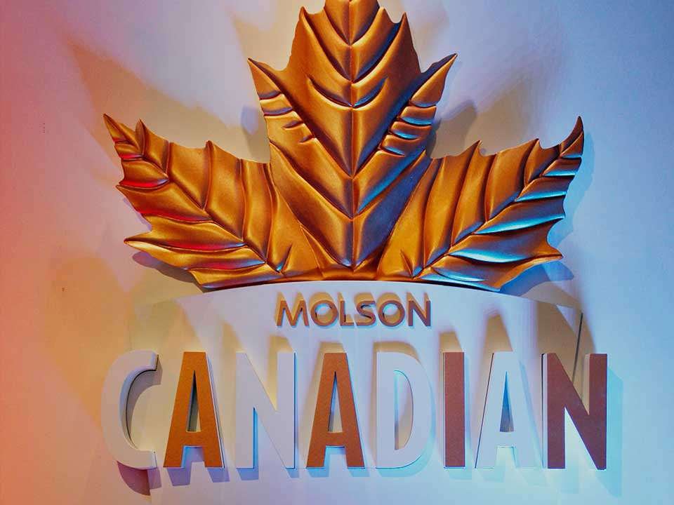 Signage_Fabrication_Molson Molson Canadian brewery signs with a sculpted golden leaf and dimensional letters.